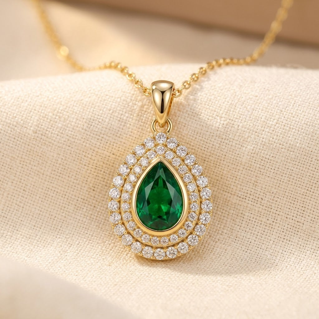 Collana a goccia in oro e smeraldo