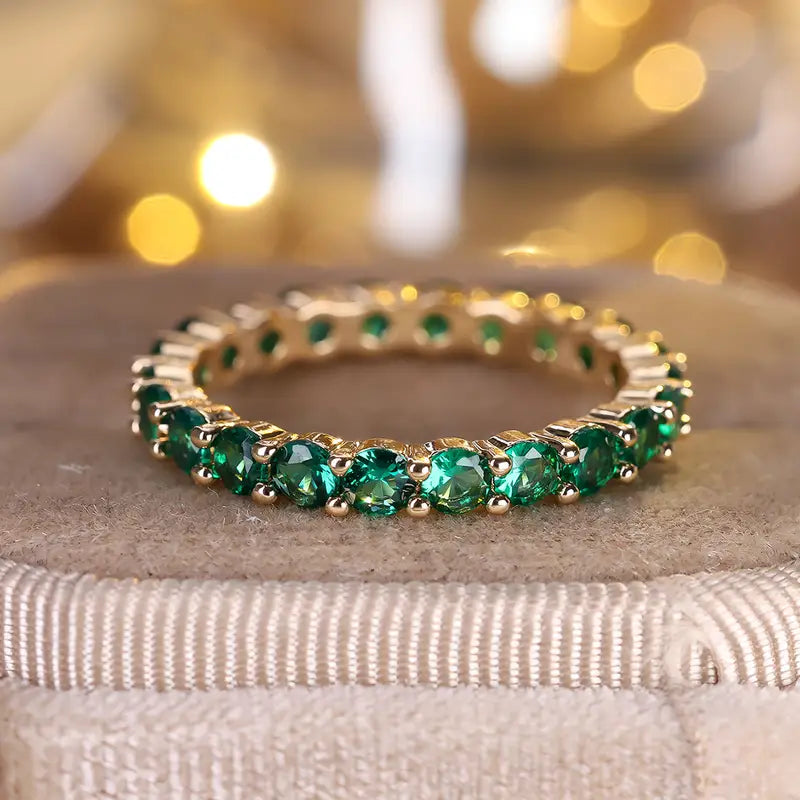 Anello Eternity Luneth Ardenelle | Dorato e Verde Smeraldo