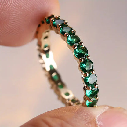 Anello Eternity in Oro e Smeraldo