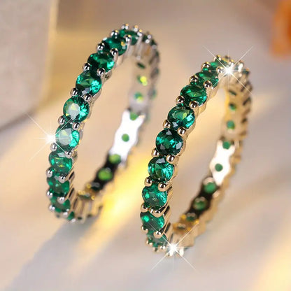 Anello Eternity Luneth Ardenelle | Dorato e Verde Smeraldo
