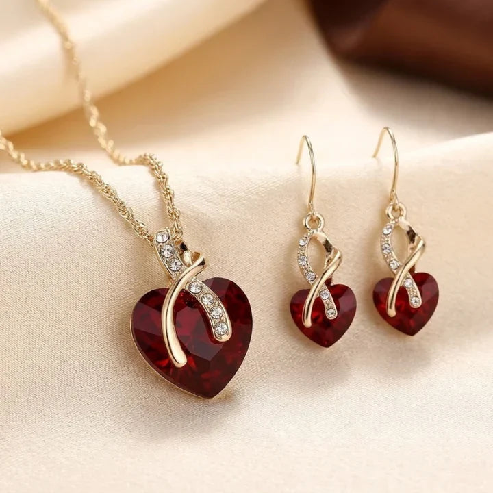 Set di gioielli cuore intrecciato rubino in oro