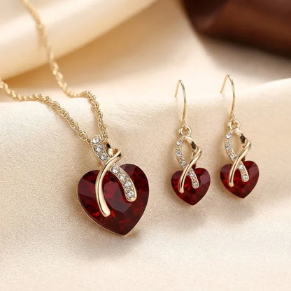 Set di gioielli cuore intrecciato rubino in oro