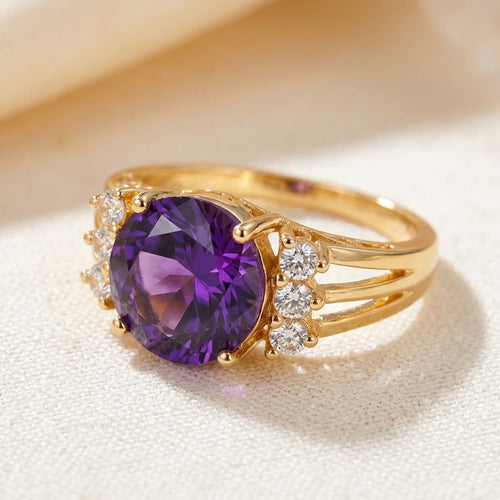 Anello in oro con ametista a bandina divisa