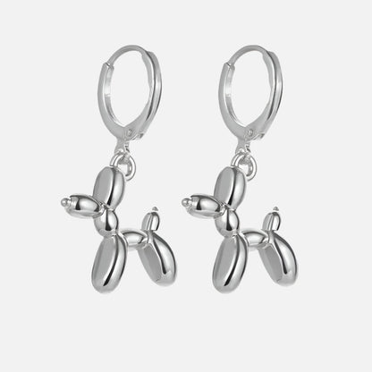 Orecchini Huggie Dorati con Charm Mini Cagnolino