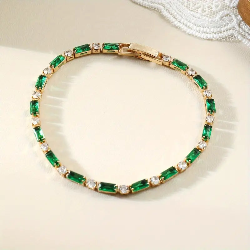 Bracciale Tennis Miralyn Sevrine | Dorato con Pietre Verde Smeraldo