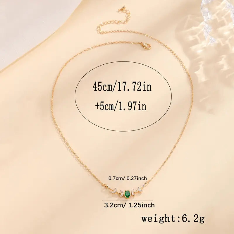 Collana Amira Valmorin | Dorata con Ramo e Pietra Verde Smeraldo