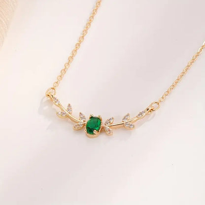 Collana Amira Valmorin | Dorata con Ramo e Pietra Verde Smeraldo