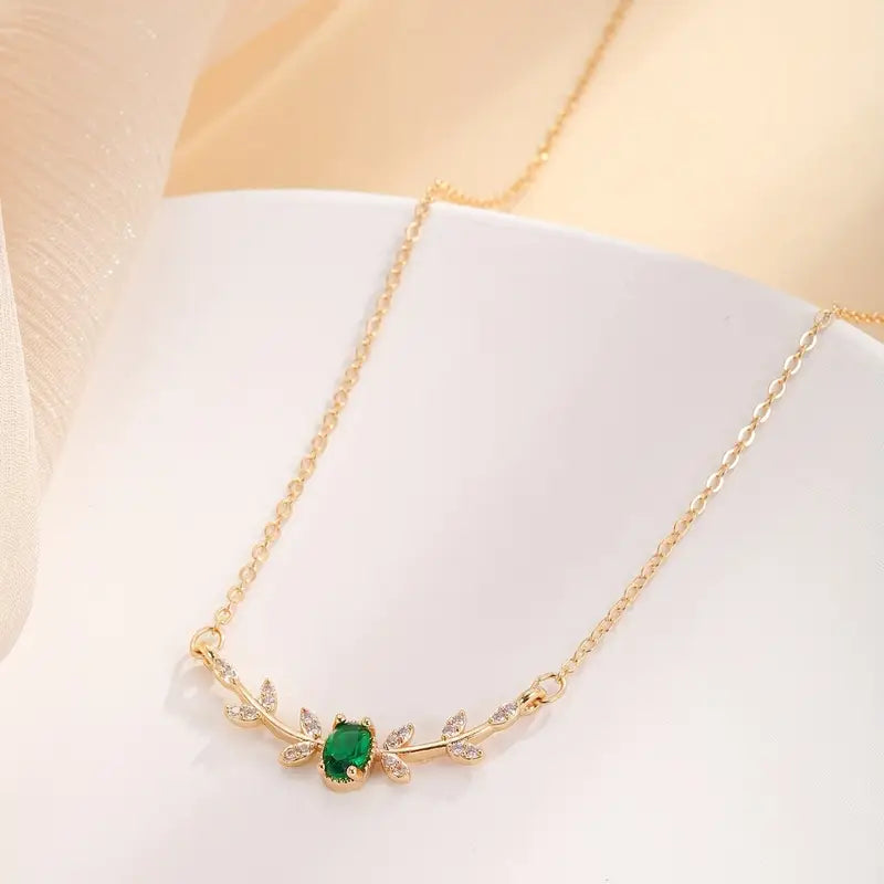 Collana Amira Valmorin | Dorata con Ramo e Pietra Verde Smeraldo