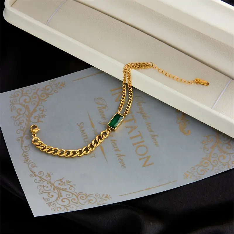 Bracciale a catena con barretta in oro ed ematite