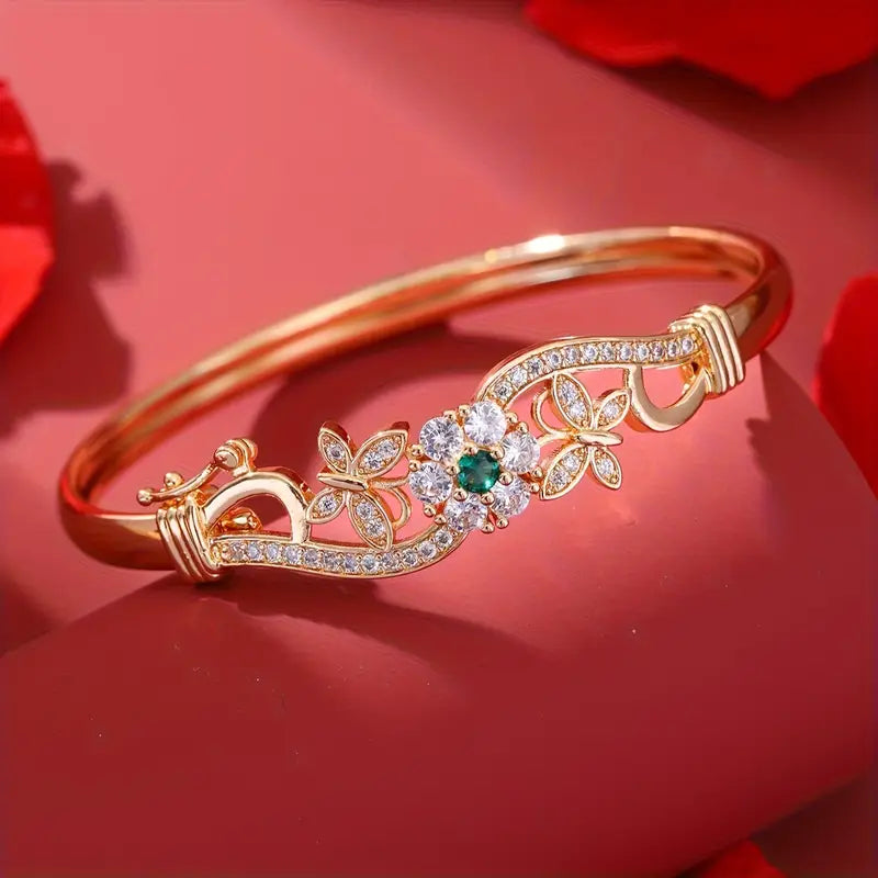 Bracciale Rigido Isla Beaumont | Dorato con Dettaglio Verde Smeraldo