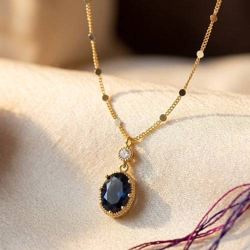Collana a Goccia Ovale in Zaffiro Dorato
