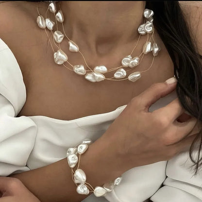 Set di Collana e Bracciale con Perle Luminose