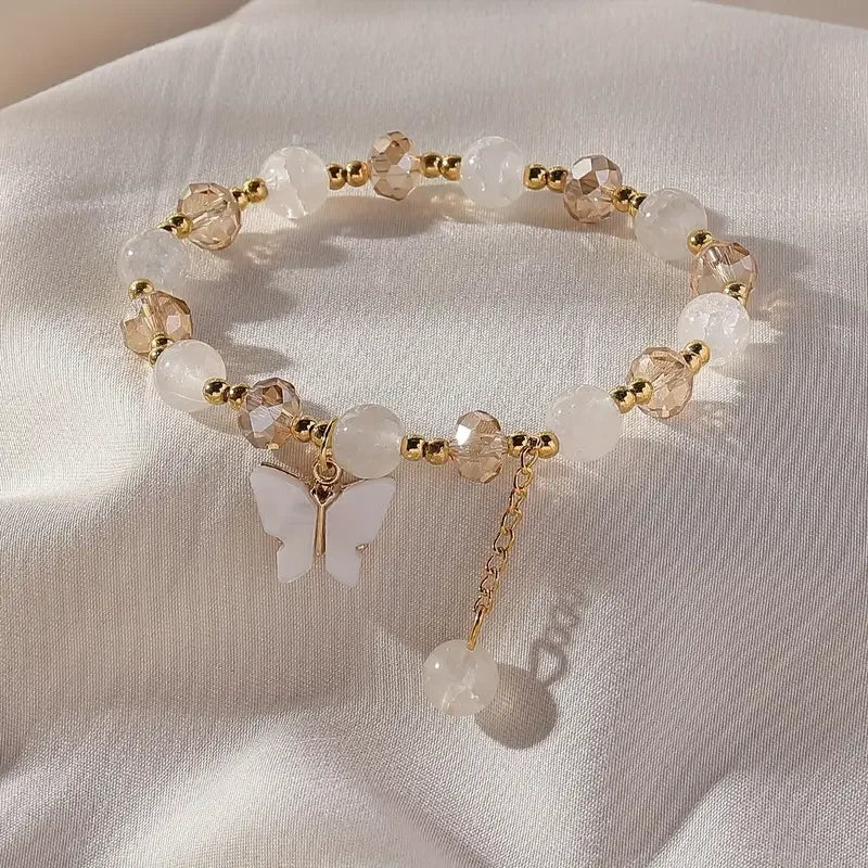 Bracciale Elastico con Perline Sfaccettate e Charm Farfalla