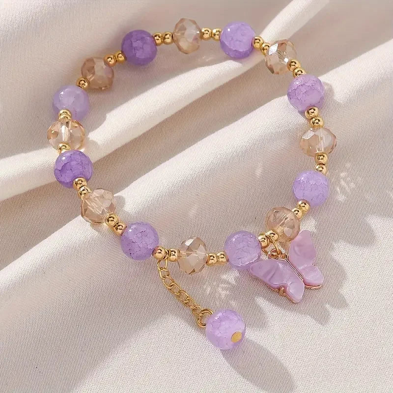 Bracciale Elastico con Perline Sfaccettate e Charm Farfalla