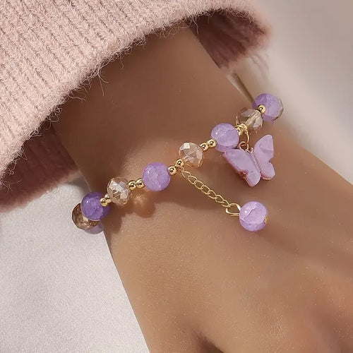 Bracciale Elastico con Perline Sfaccettate e Charm Farfalla