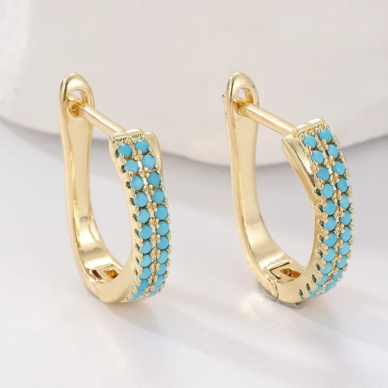 Orecchini Huggie Classici con Pavé Turchese | Dorati