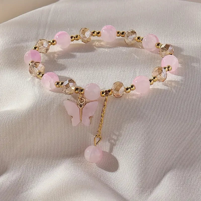 Bracciale Elastico con Perline Sfaccettate e Charm Farfalla