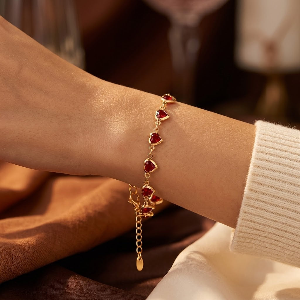 Bracciale catena cuore rubino in oro
