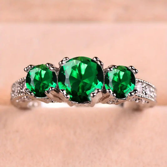 Anello Trilogy Serilda Wynloren | Color Oro Bianco e Verde Smeraldo