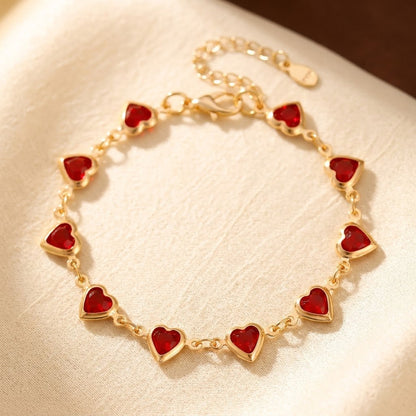 Bracciale catena cuore rubino in oro