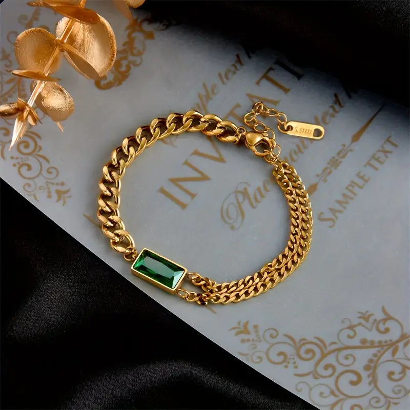 Bracciale a catena con barretta in oro ed ematite