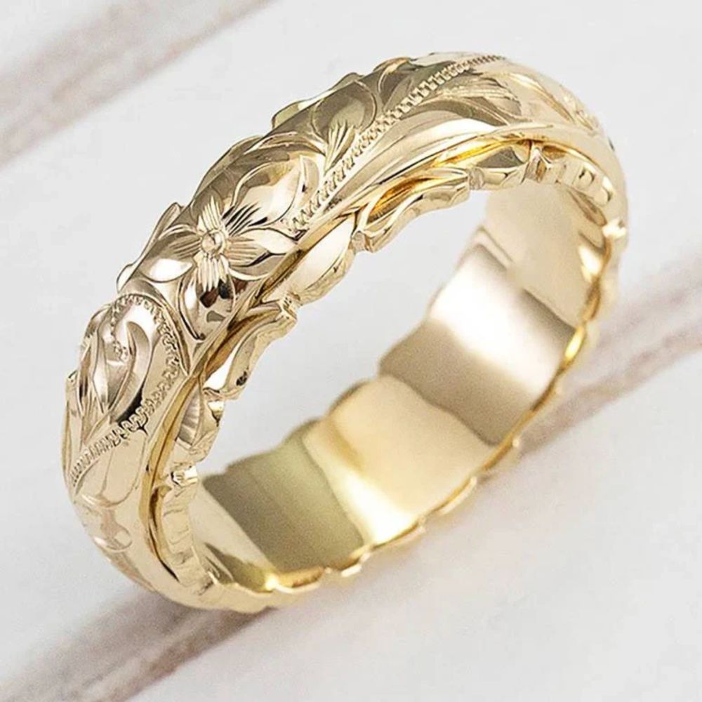 Anello a forma di fiore in oro antico
